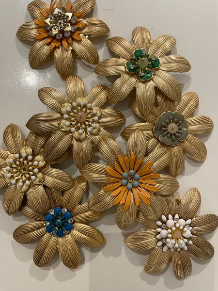 Spille fiore a otto petali