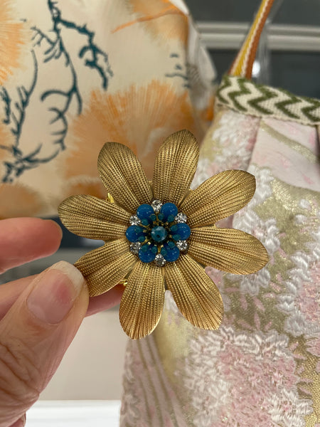 Spille fiore a otto petali