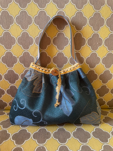 Borsa media blu fiorata