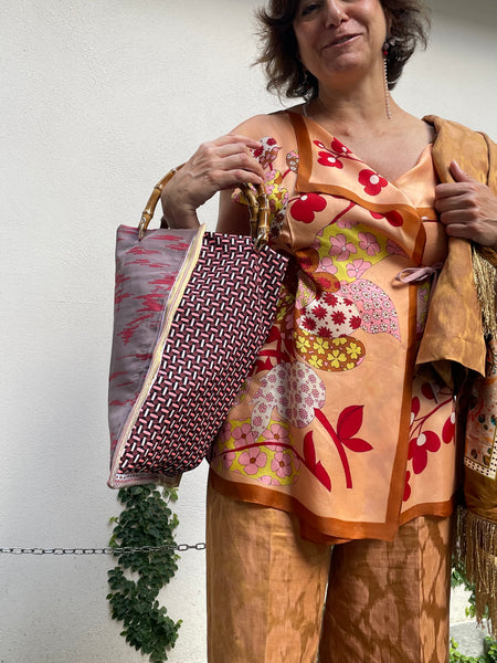 Borsa “contromano” rosso e malva