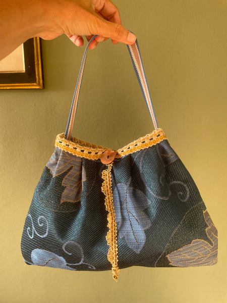 Borsa media blu fiorata