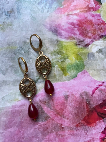 Orecchini con motivo traforato a otto