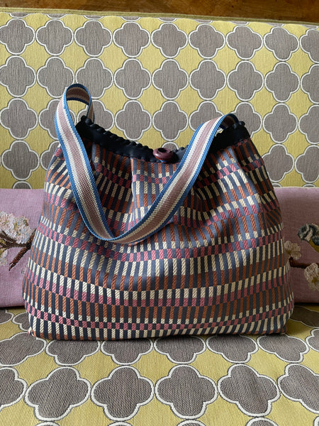 Borsa media in tessuto a rettangolini avio, rosa e bronzo