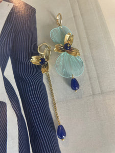 Gemelli diversi ali e fiori blu e azzurro