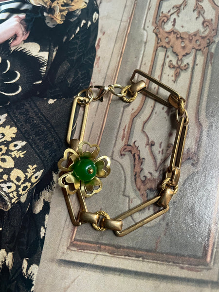Bracciale a maglia rettangolare e fiore
