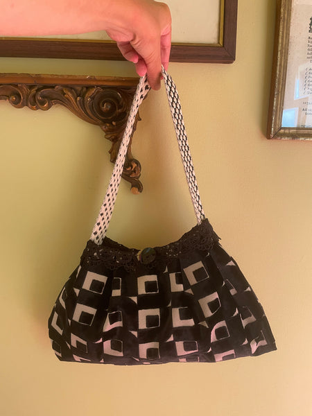 Borsa media in velluto a disegni geometrici neri
