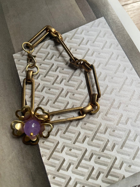 Bracciale a maglia rettangolare e fiore