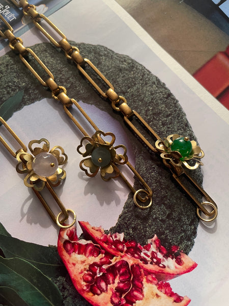 Bracciale a maglia rettangolare e fiore