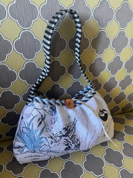 Borsa tessuto con airone