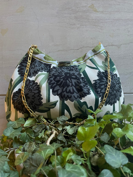 Borsa media in tessuto a fiori verde e nero
