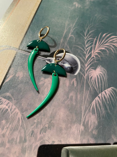 Orecchini mezzaluna e coda