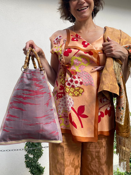 Borsa “contromano” rosso e malva