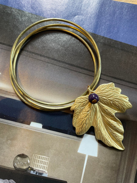 Bracciale a tre giri e fiore