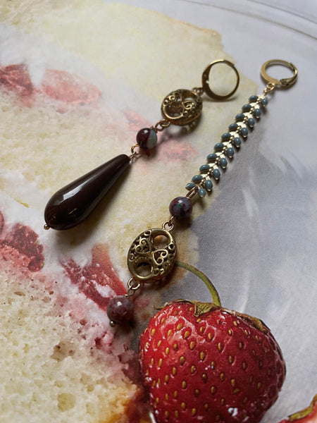 Gemelli diversi grigio e marrone con spina di pesce