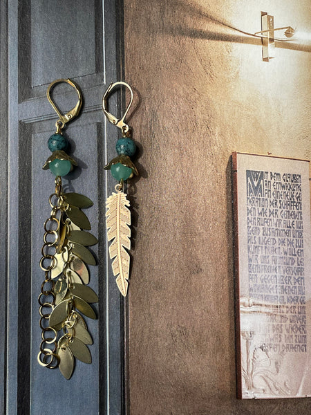 Gemelli diverse verde acqua con piuma