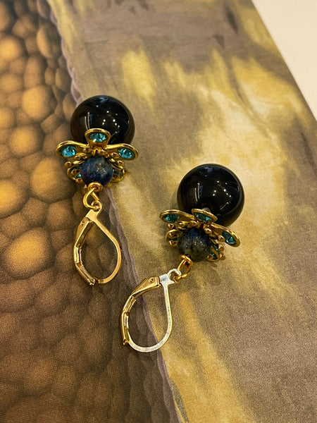 Orecchini navicella a fiore tridimensionale