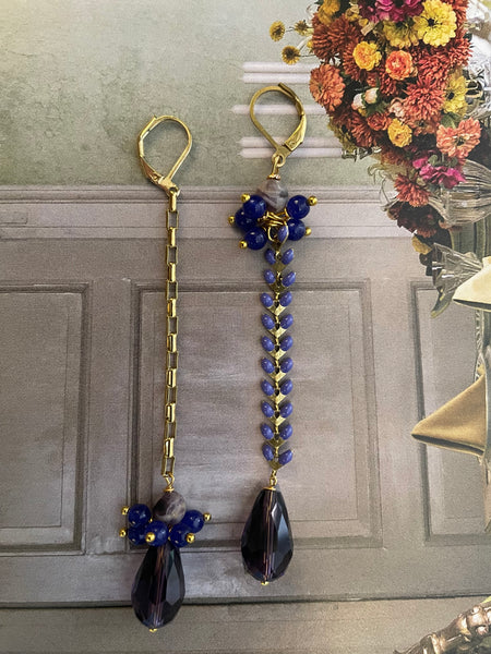 Gemelli diversi viola e blu con catenina a spina di pesce