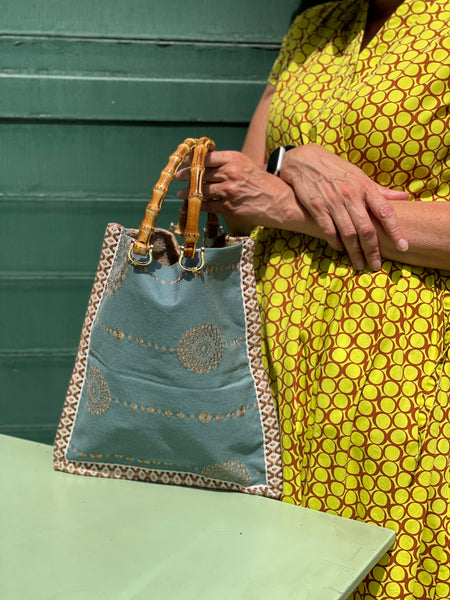 Borsa “contromano” ocra damascato e carta da zucchero