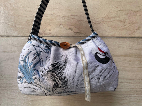 Borsa tessuto con airone